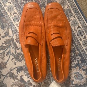 Prada Men's Vibrant Orange Leather Slip-Ons